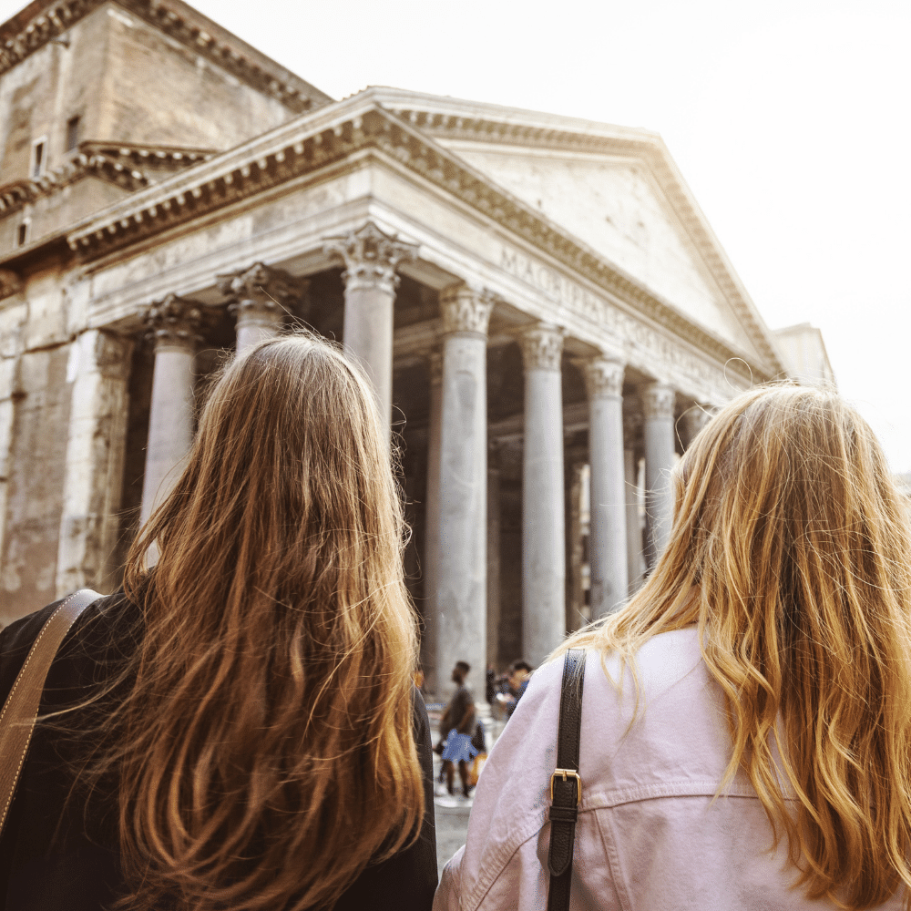 Women traveling with tote bags