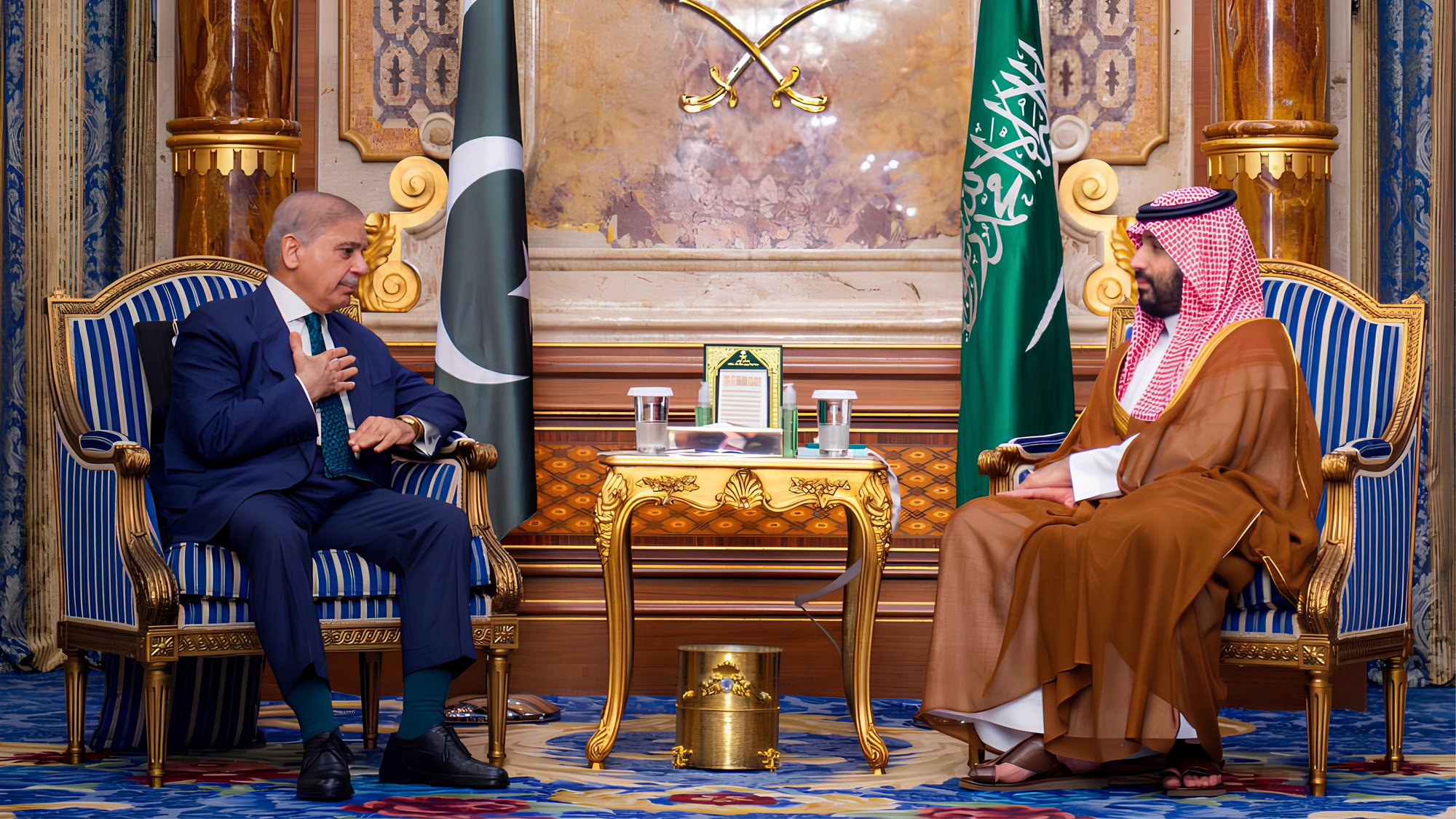 Saudi Crown Prince Mohamed bin Salman, sitting on the right, meets with Pakistan's Prime Minister Shehbaz Sharif sitting on the left in Jeddah.