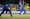 Photo of India women's cricket captain Harmanpreet Kaur batting as a Sri Lanka fielder looks on during ICC Women's Cricket Wo