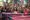 A group of Hindu protesters wearing red, carrying torches and placards, protesting anti-Hindu violence in Bangladesh