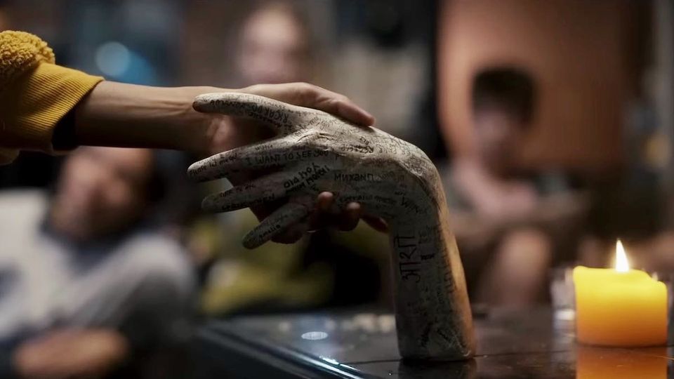 I would absolutely touch the hand in Talk to Me