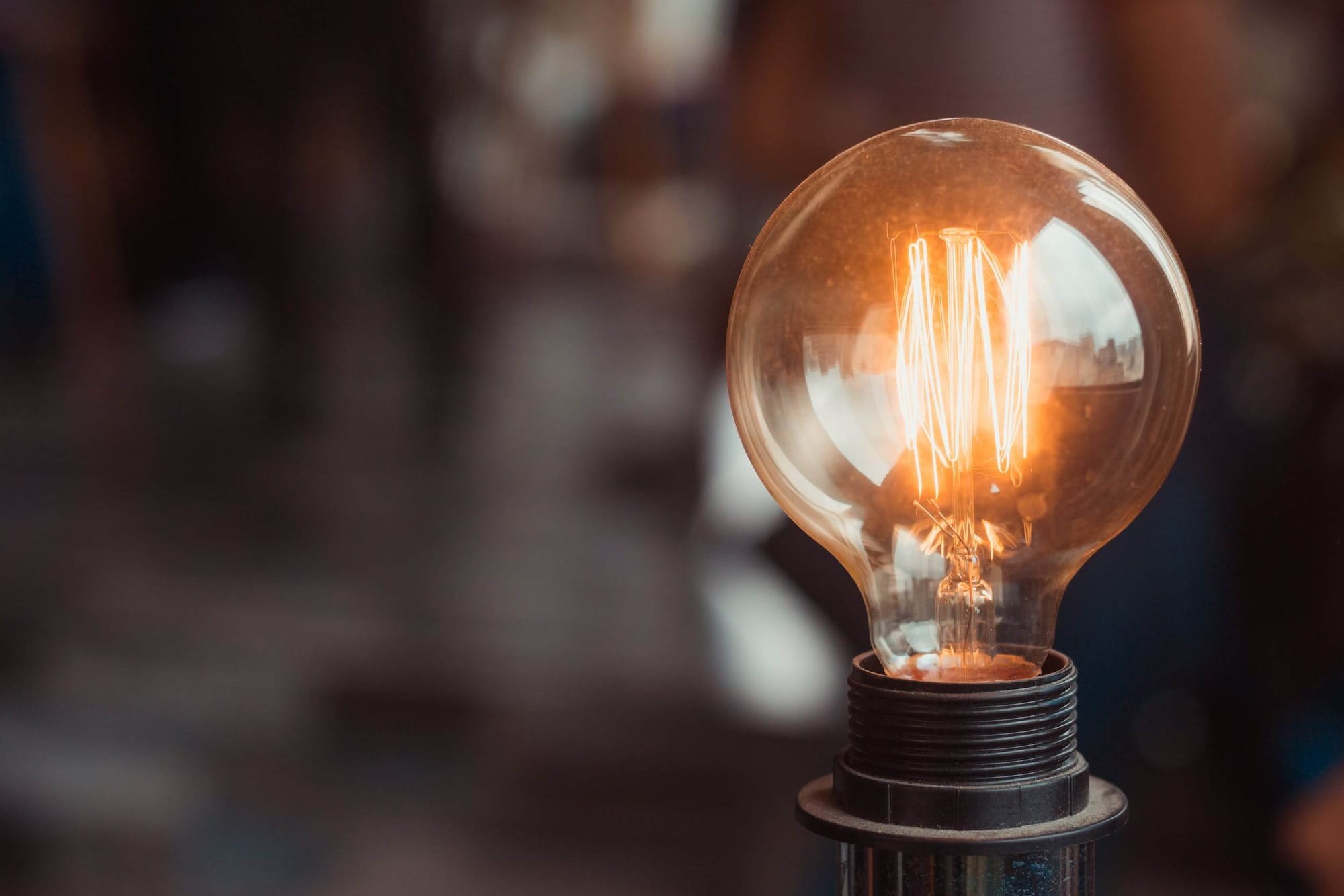 An industrial light bulb turned on