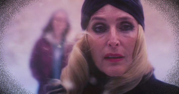 Image of Gillian Anderson as Billy Presley in Teenage Sex and Death at Camp Miasma with Hannah Einbinder as Kris in the background