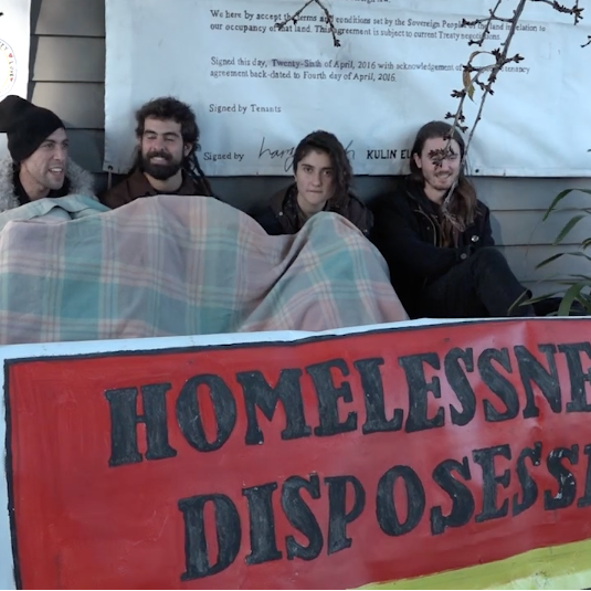 Freeway homes become homeless battleground