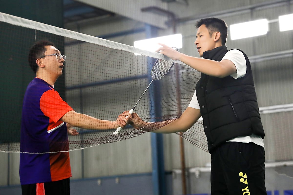 Two men at the net
