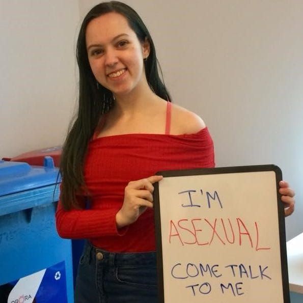 A student and a signboard help raise awareness on asexuality post image
