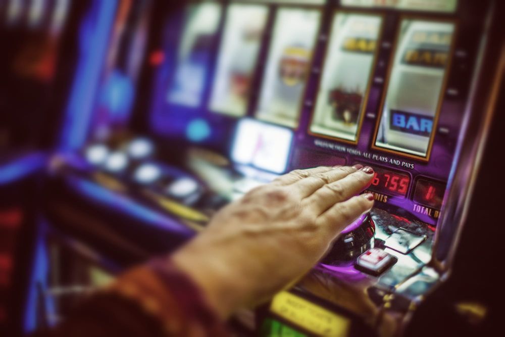 Woman jailed for stealing to fund pokies habit demands gambling reform post image
