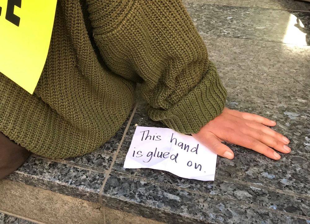 Climate activists superglue themselves to IPA's headquarters post image