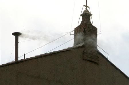 hoto of white smoke emanating from a chimney