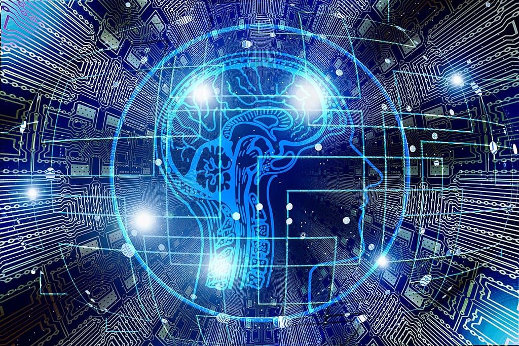 Drawing of a human brain superimposed upon the circuitry of a computer chip