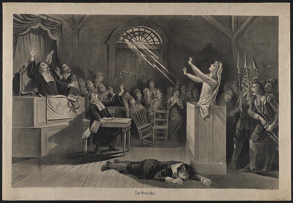 A 17th-century court in an uproar, a woman in the dock, lightning comes through a window, a man lies prone on the floor