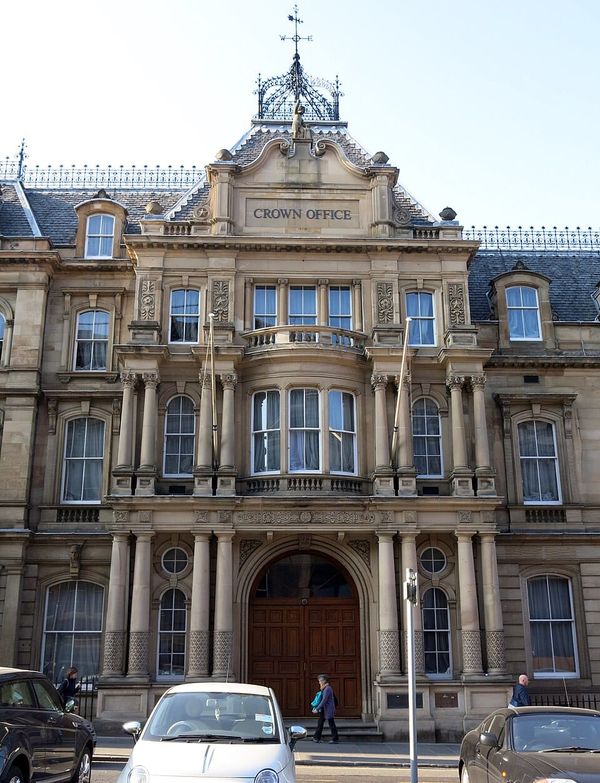 Photo of an ornate, stone building in the Free Renaissance style