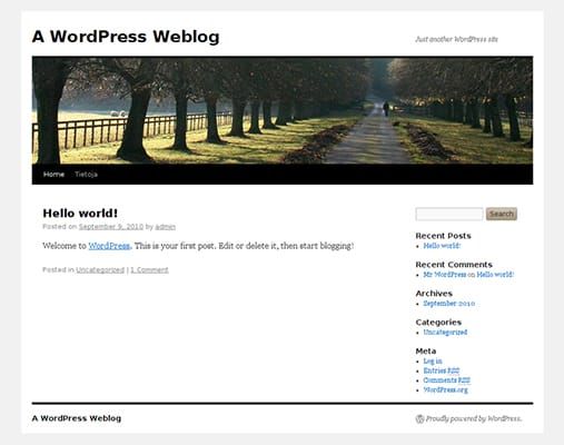 Screenshot of a blog homepage with the title “A WordPress Weblog,” a generic picture, and a first post titled “Hello world!”