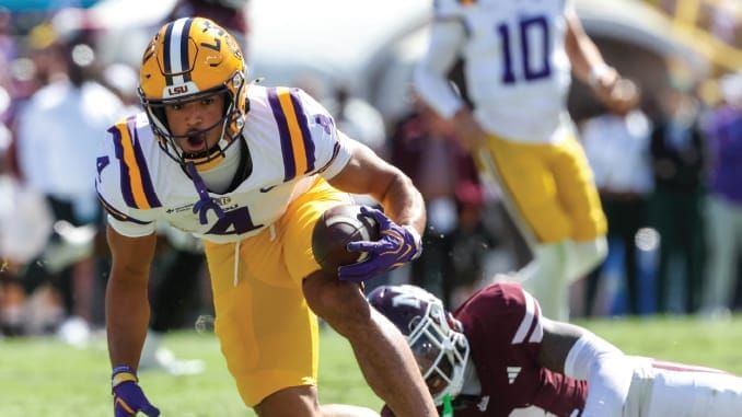 Injury watch: EDGE Princewill Umanmielen exits with a head injury; WR Jackson Harris leaves after two TDs with an apparent ankle injury