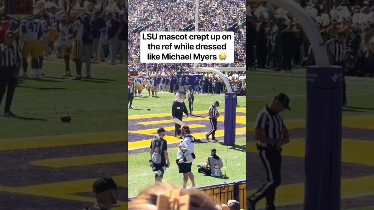 Watch: LSU’s Mike the Tiger mascot, dressed as Michael Myers for Haunted Homecoming, creeps up on a referee and a staffer has to hold him back