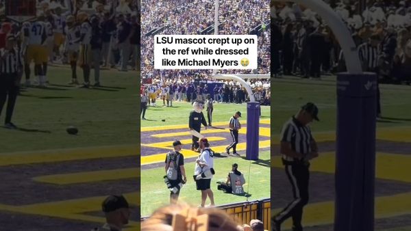 Watch: LSU’s Mike the Tiger mascot, dressed as Michael Myers for Haunted Homecoming, creeps up on a referee and a staffer has to hold him back