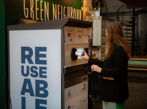 Re-useable coffee cup returned via a reverse vending machine in Aarhus, Denmark.