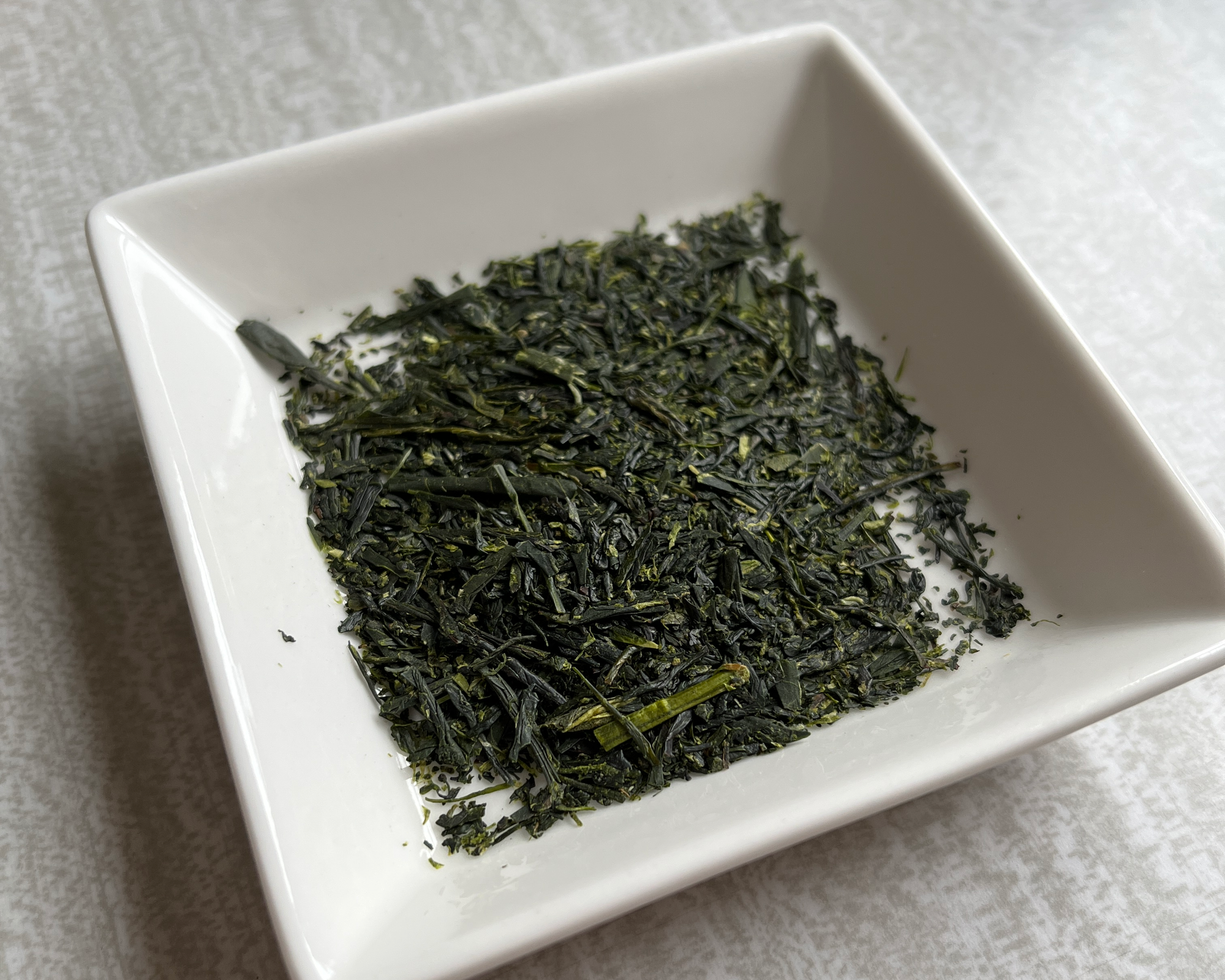 A sample of dry leaf from the tea, you can see how the colour is preserved.