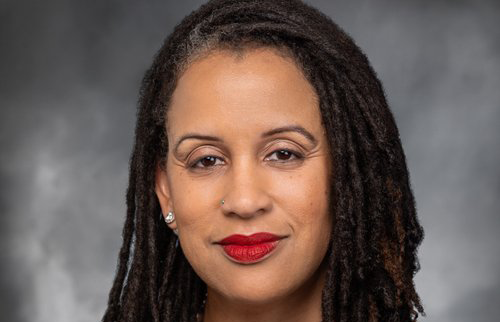 A portrait of representative April Berg, who's looking into the camera.