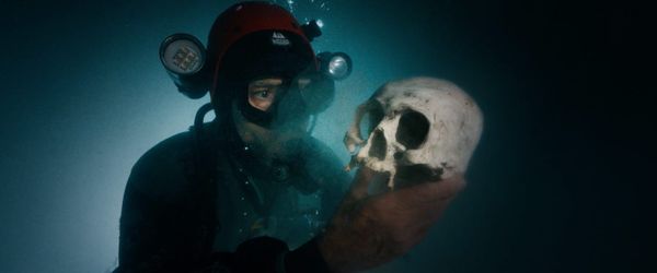 Jeronimo + skull, still from Robert Petit's UNDERLAND (courtesy of Oscilloscope Laboratories)