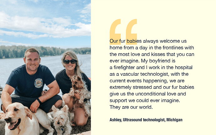 a couple with three dogs