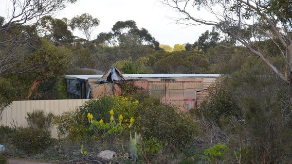 Two people hospitalised after house fire at White Hill