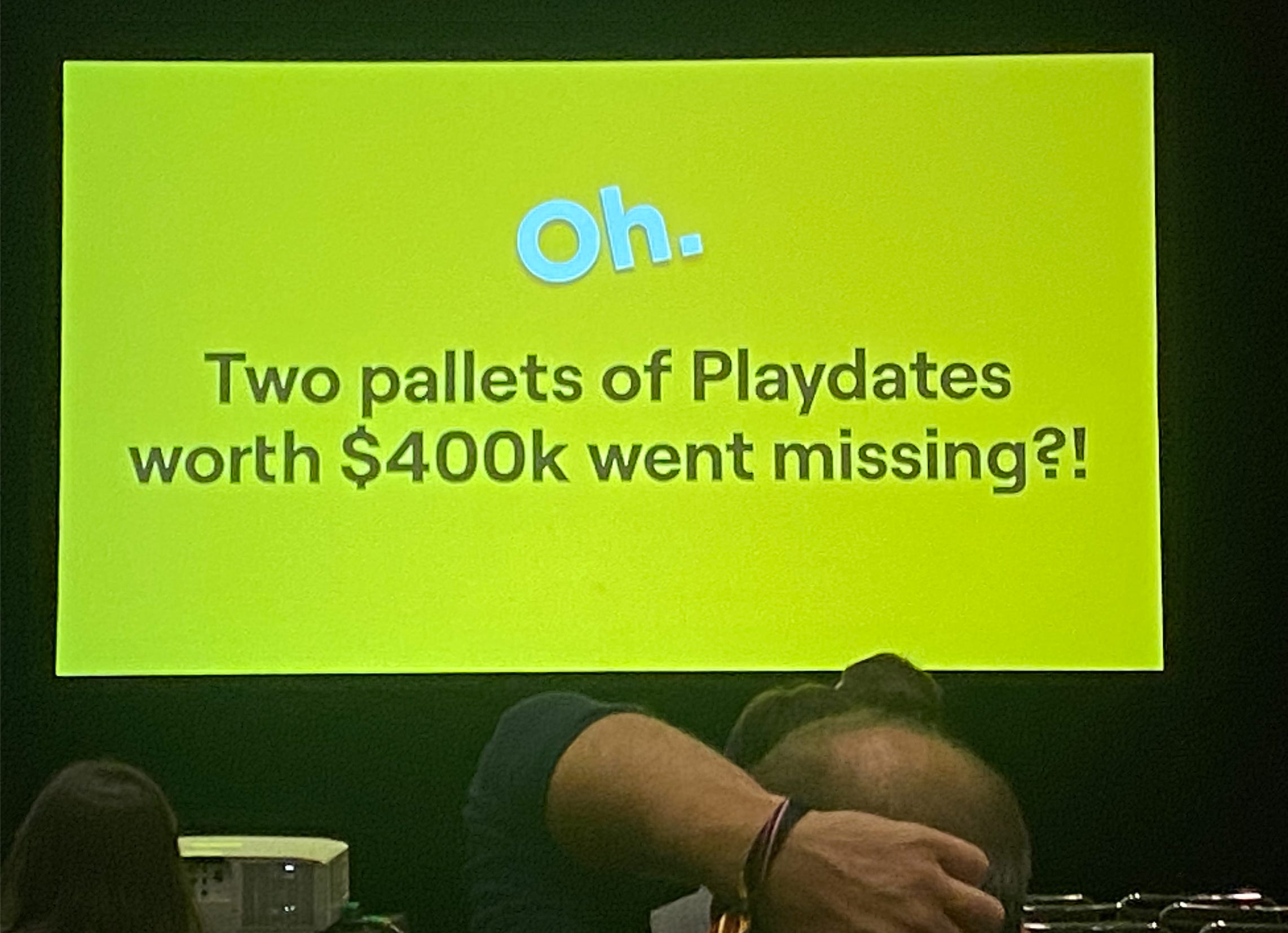 Image : Game File. Une image d’une conférence. On peut y lire le texte "Two pallets of Playdates worth $400k went missing?!"