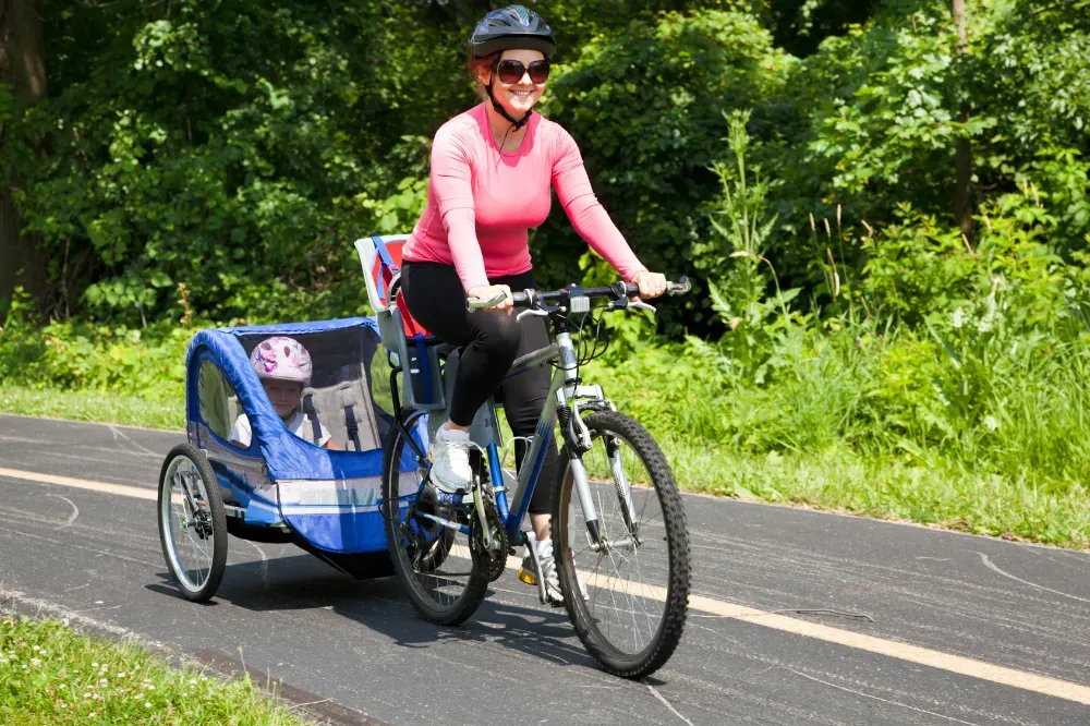 How old should a baby be to ride a bike trailer