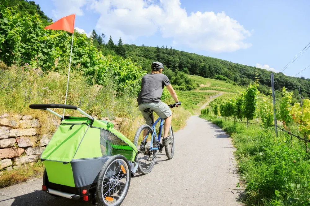 How old should a baby be to ride a bike trailer