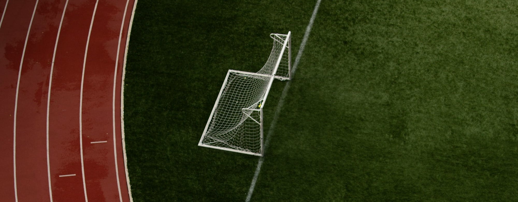 an overhead view of a soccer goal on a soccer field