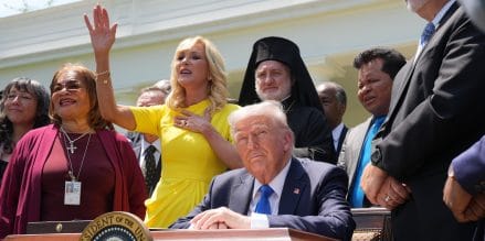WASHINGTON, DC - MAY 01: Head of the White House Faith Office Paula White sings as she stands next to U.S. President Donald Trump and other religious leaders during a National Day of Prayer event in the Rose Garden at the White House on May 1, 2025 in Washington, DC. The National Day of Prayer is a congressionally recognized observance that calls on people of all faiths to participate in a day of prayer and reflection.