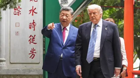 U.S. President Donald Trump and Chinese President Xi Jinping tour the garden of the Zhongnanhai leadership compound in May 2026