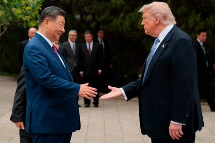 President Donald Trump, right, shakes hands with Chinese President Xi Jinping while leaving after a visit to the Zhongnanhai Garden in Beijing, Friday, May 15, 2026.
