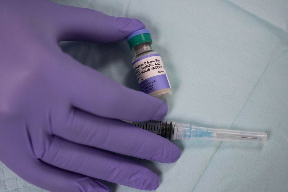 3,900 Measles Cases. Eight Dead. The HHS Secretary Spoke at an Anti-Vax Convention While Pennsylvania Buried Its Fifth Victim.