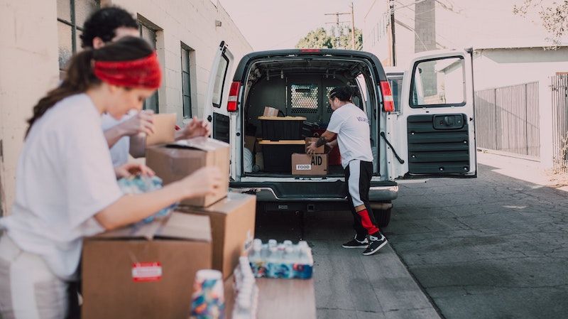 Volunteers loading a van