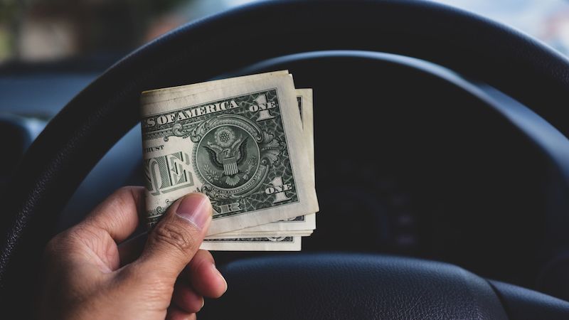 Cash and a steering wheel