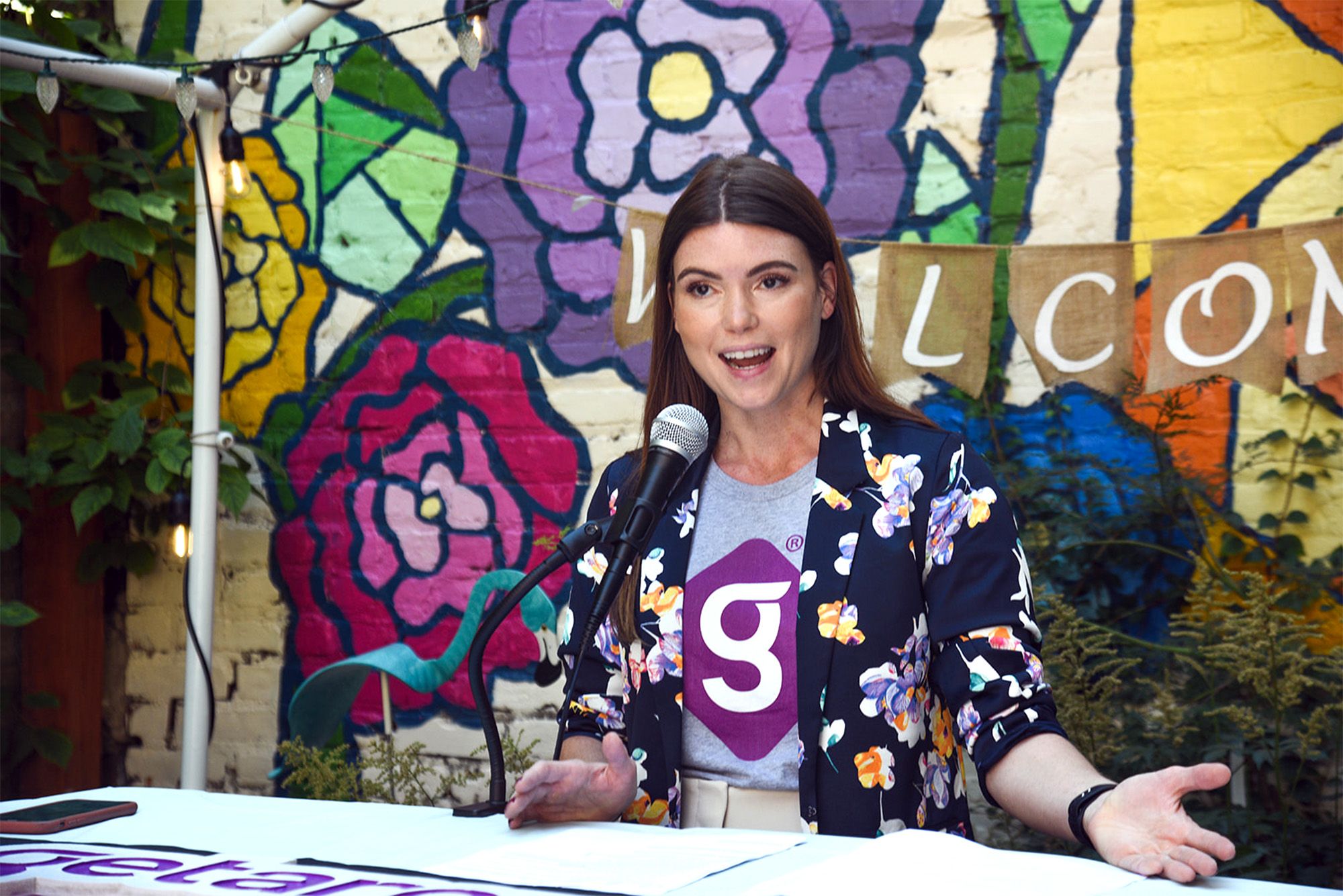 Adrienne Moretz, Manager of Government Partnerships at Getaround, welcomes the event attendees. 