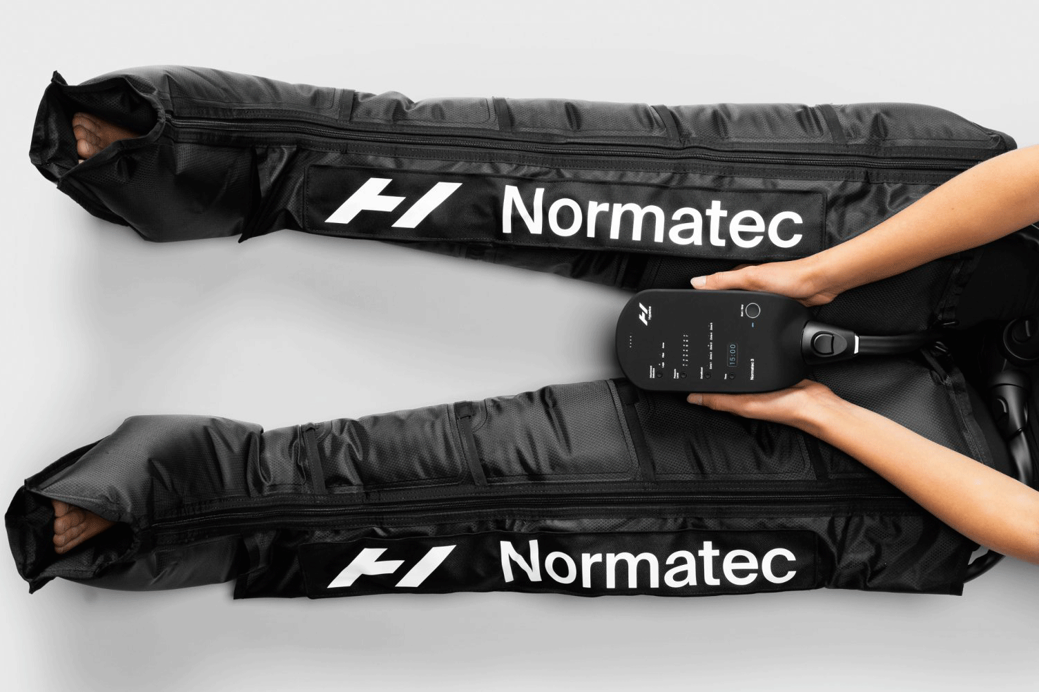 A person using Normatec 3 for total body relief