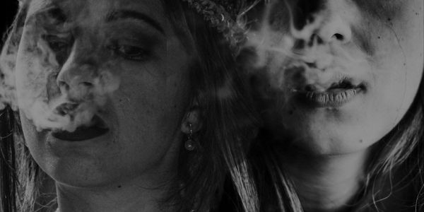 Backhouse Studio  2 women smoking