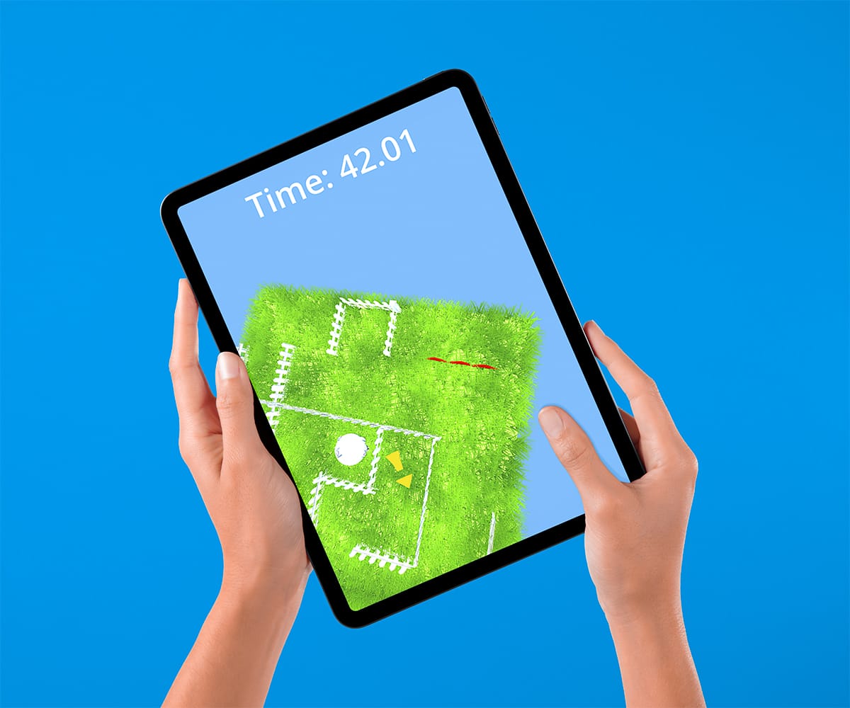 Rollbit gameplay on an iPad being held with two hands