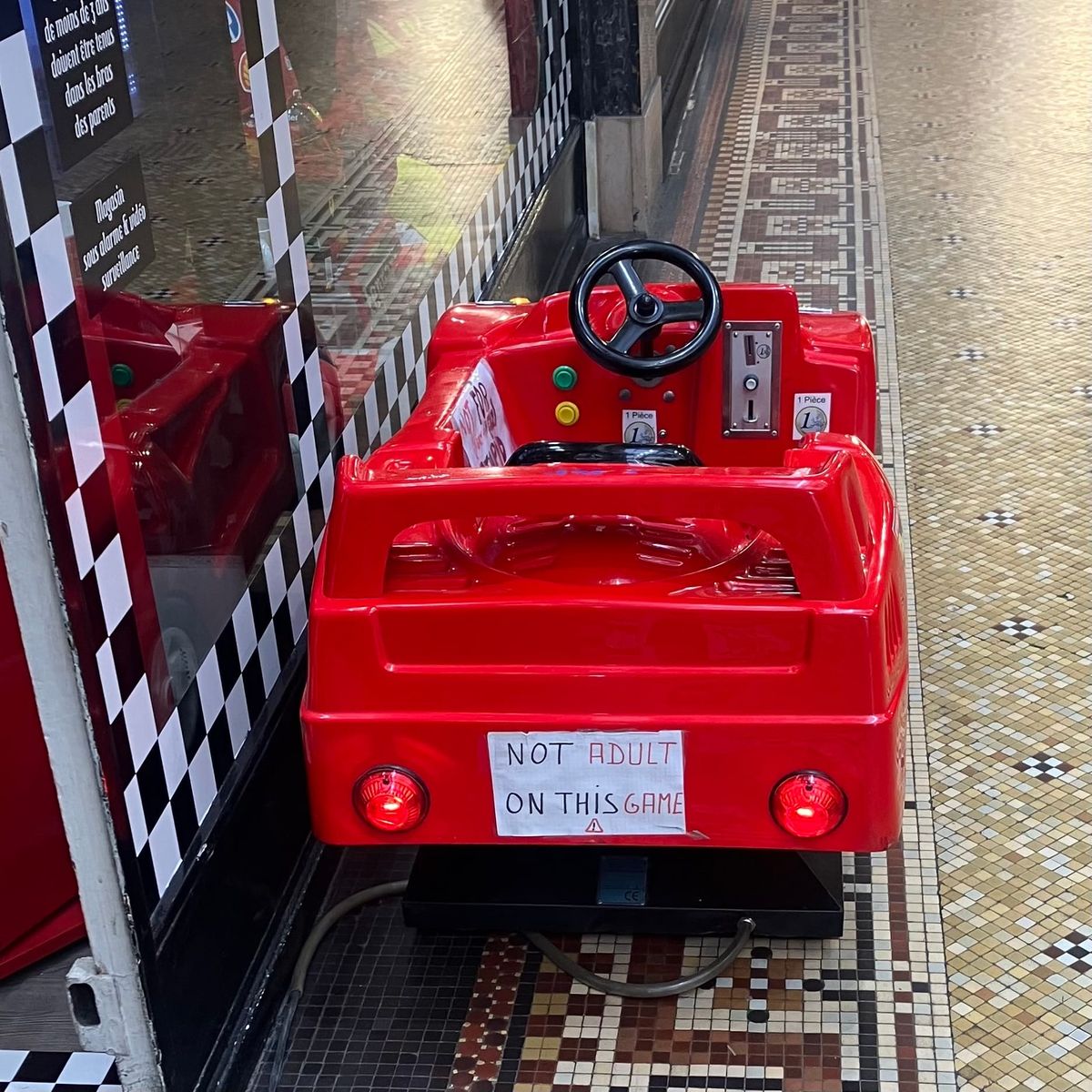 Bumming a cigarette to a French child outside the horse butcher