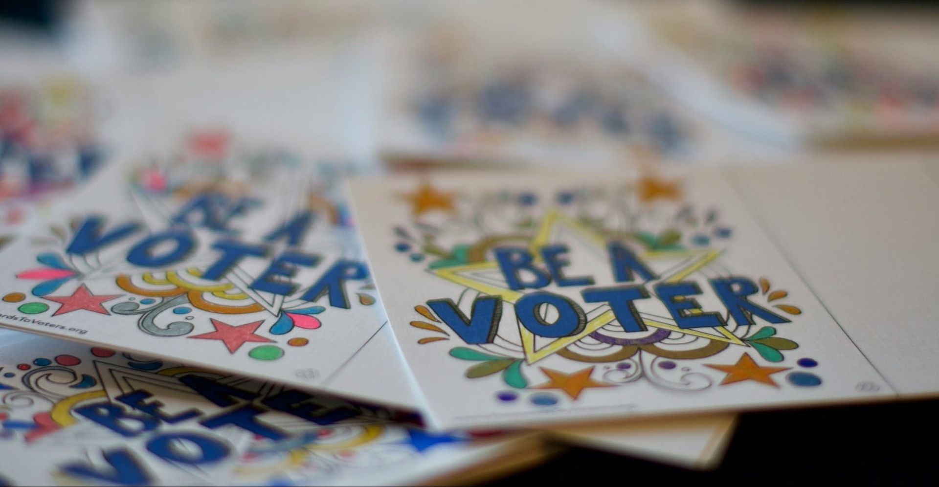 Hand colored Be a Voter cards made by volunteers