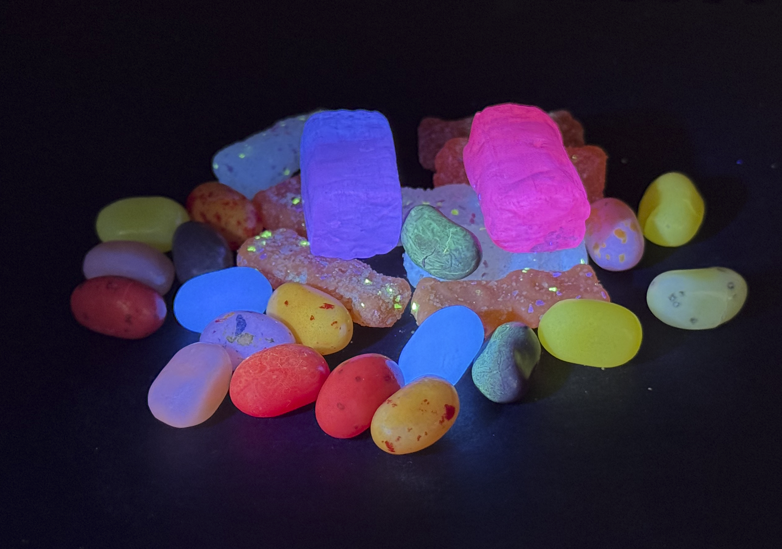  The biggest, brightest thing in the pile is the watermelon Jolly Rancher, followed by some of the berry blue Jelly Belly beans.