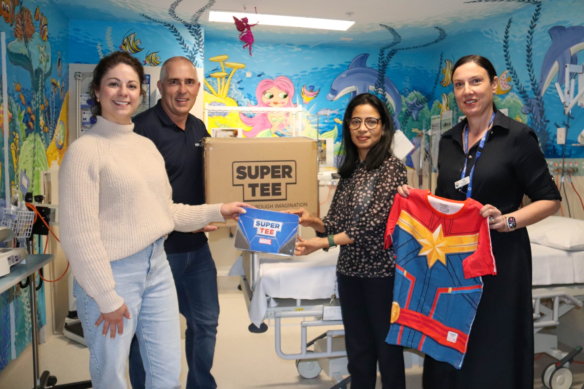 Reflect's Krystal Novak and Peter Smith, paediatric nurse unit manager Babymol Varkey and Fundraising Support Officer Melissa Patterson.