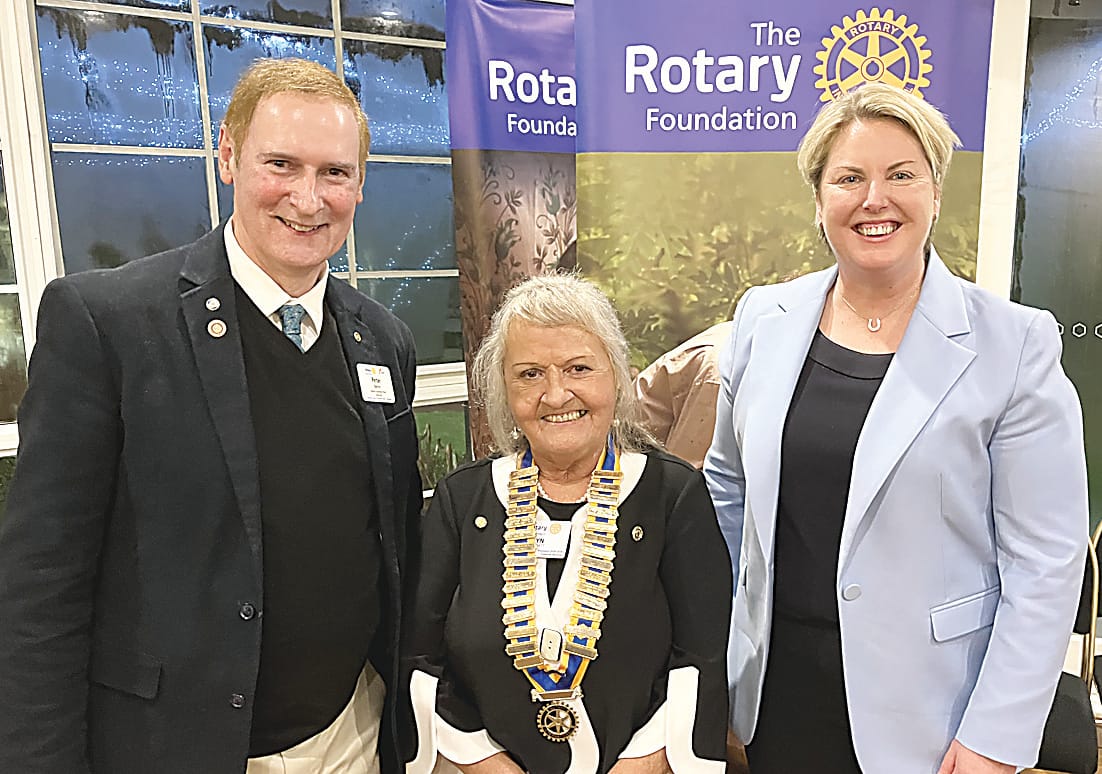 District Governor Peter Behm and Member for Monash Mary Aldred (right) congratulate new Warragul Rotary Club president Lyn Bennett.