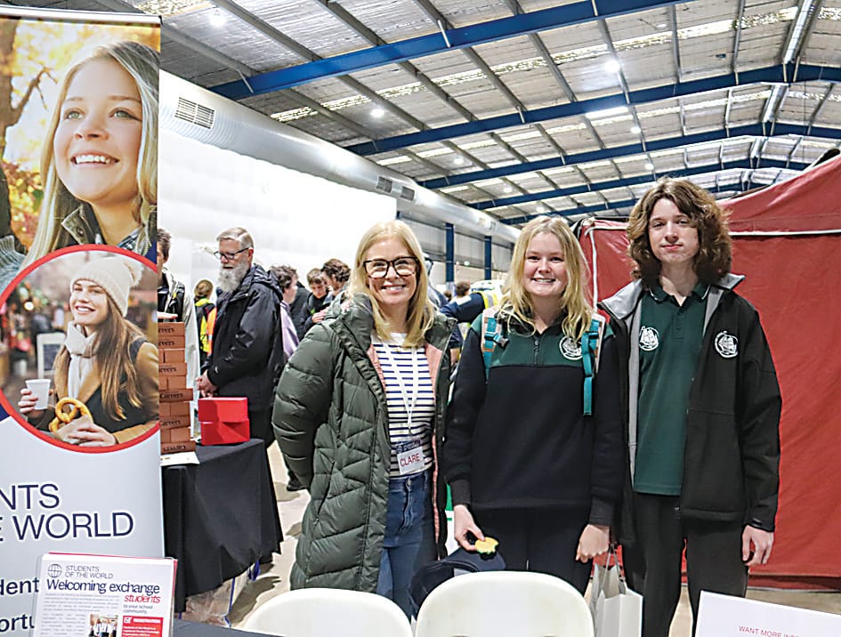 Left: On the Victoria Police stand are (from left) leading senior constable, Paula Fowler, Drouin Secondary College students Aaron Lawrence and Brodie Brindley and leading senior constable Warren Briggs.Right: At the Students of the World Exchange stand are Clare Sacker with Trafalagar High School studnets Tilly Ott and Alexander Wheatland.