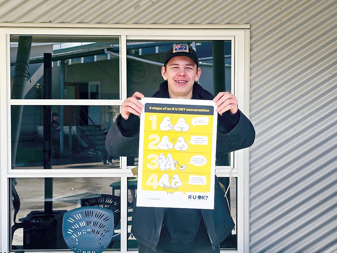 Noah Price from the year 10 Live 4 Life crew promoting the R U Ok conversations steps  Ask R U Ok, listen, encourage action and check in.
