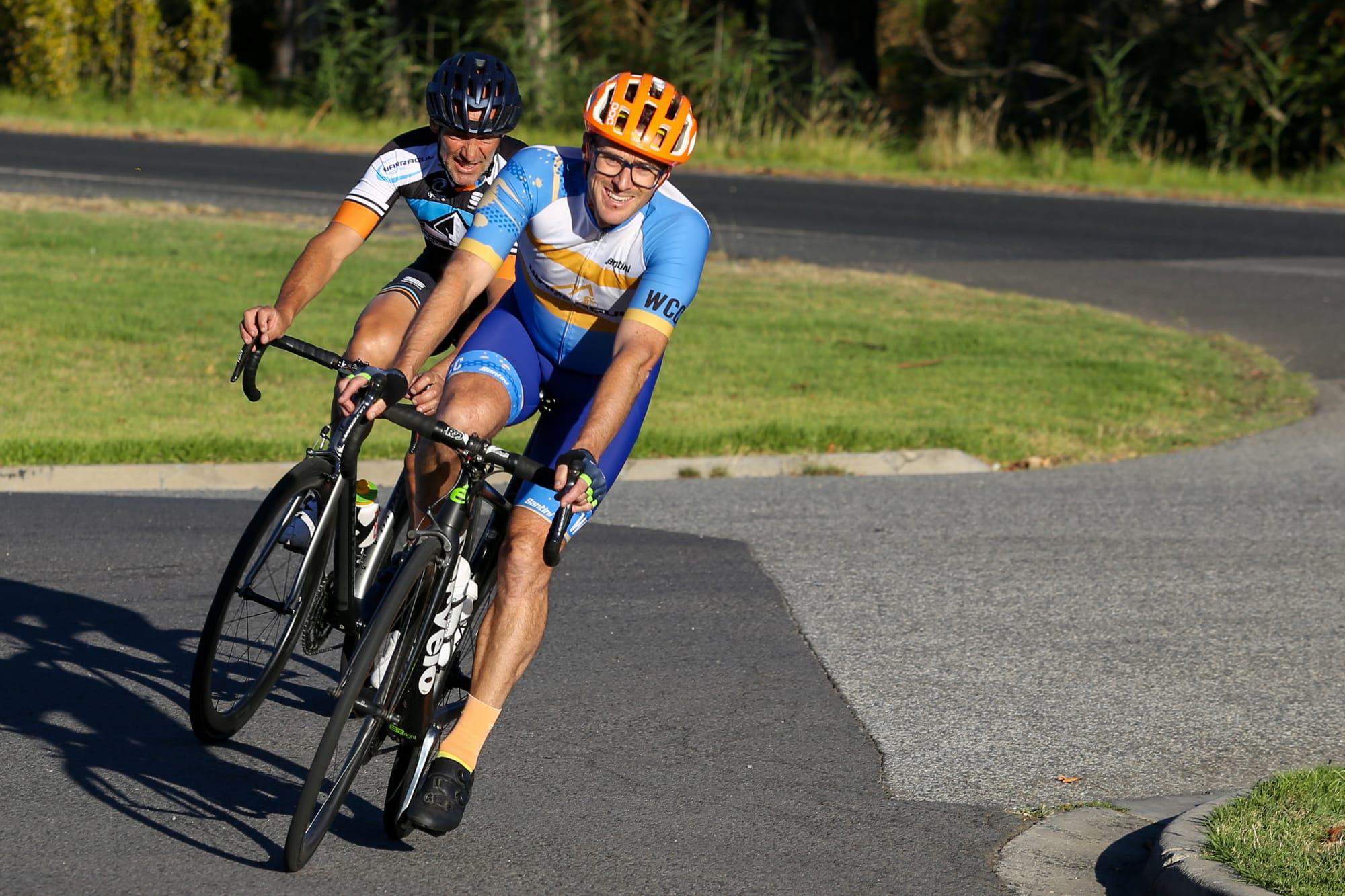 Warragul Cycling Club president Glenn Marriott is all smiles as he leads George Tambassis.