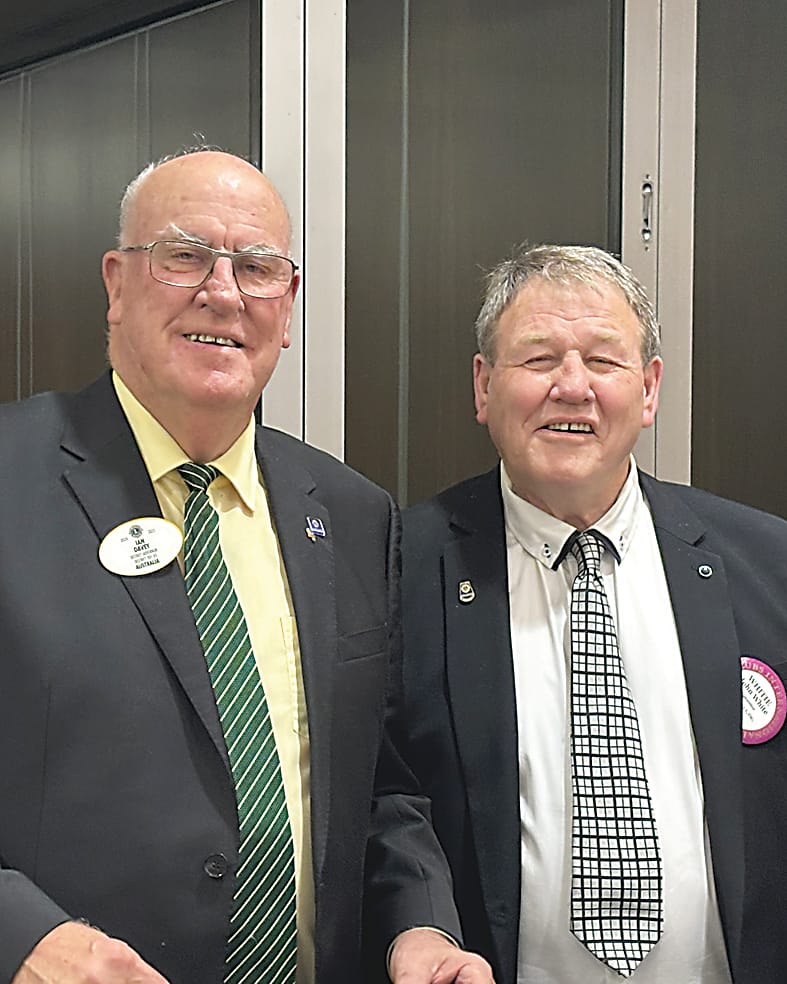 Above: Lions District Governor Ian Davey congratulates Warragul Lions Club president John White on his second term.