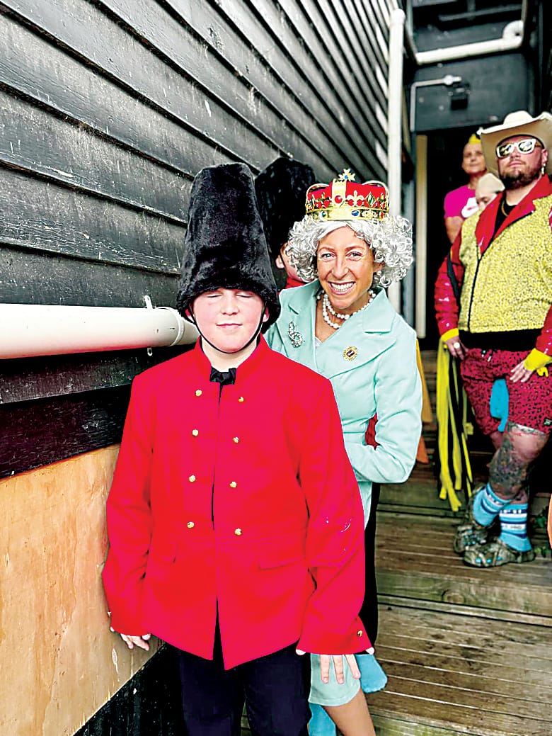 Above: Nellie Loughridge and her son Ollie donned their royal attire for the Big Freeze event, dressed as the Queen and a royal guard.Right: Tate Burgmann took an icy dip dressed as Shane Warne.